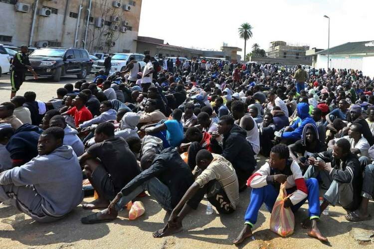 DR - Migrants gather at the Tripoli branch of the Anti-Illegal Immigration Authority. Photograph: Mahmud Turkia/AFP/Getty Images